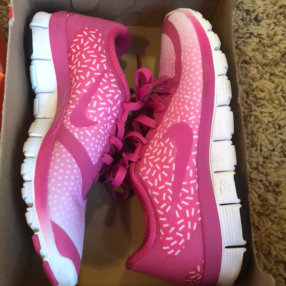 Fairly new women’s pink Nike casual/running shoes
